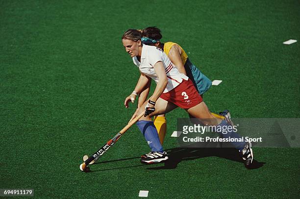Kirsty Bowden of Great Britain pictured in action making a run with the ball past an Australian player during the first round match between Australia...