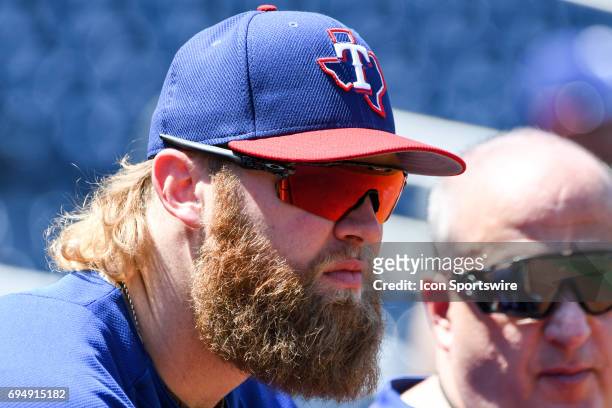 Texas Rangers starting pitcher Andrew Cashner warms up prior to an MLB game between the Texas Rangers and the Washington Nationals on June 11 at...