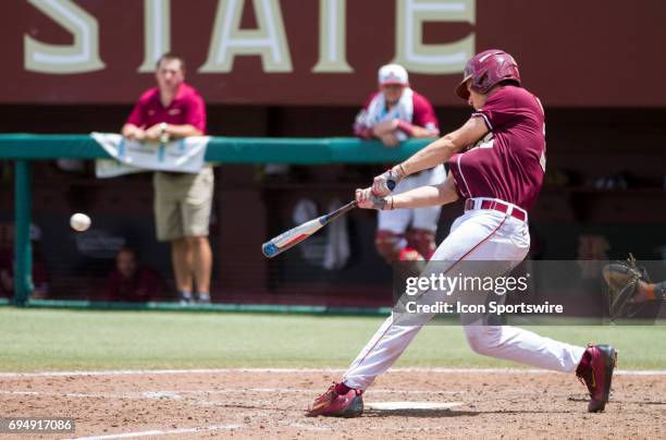 Florida State's Cal Raleigh gets a hit during the NCCA Division I Tallahassee Super Regional game between the Sam Houston State Bearkats and the...