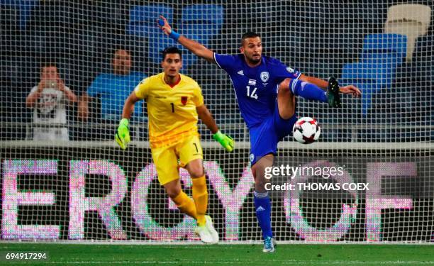 Israeli forward Ben Sahar controls the ball in front of Albanian goalkeeper Thomas Strakosha during the FIFA World Cup 2018 qualification football...