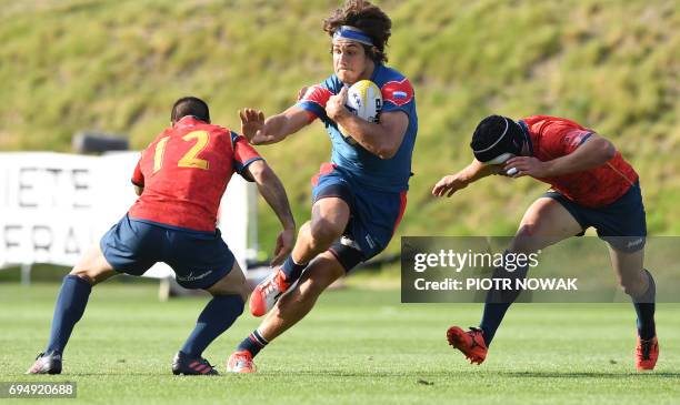 German Davydov of Russia vies for the ball with Lucas Levi and Sergi Sevilla of Spain during the Men's Sevens Grand Prix Series Final Match Spain vs...