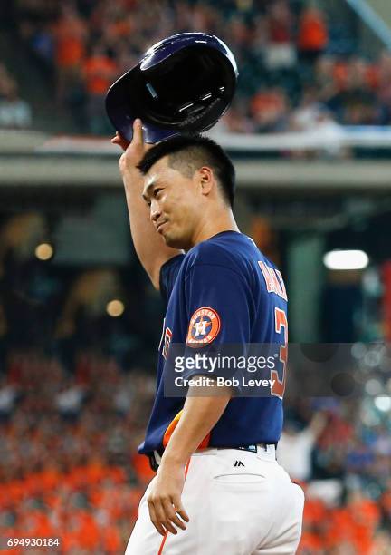 Norichika Aoki of the Houston Astros acknowledges the crowd after hitting a single in the sixth inning for career hit 2000 against the Los Angeles...