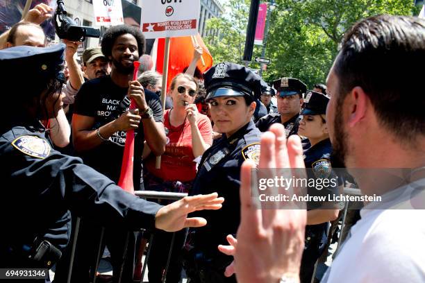 Left wing protestors confront the alt-right group Act for America as it holds a rally to protest sharia law on June 10, 2017 in Foley Square in New...