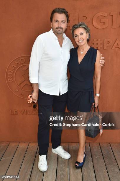 Henri Leconte and Maria Dowlatshahi attend the Men Final of the 2017 French Tennis Open - Day Fifteen at Roland Garros on June 11, 2017 in Paris,...