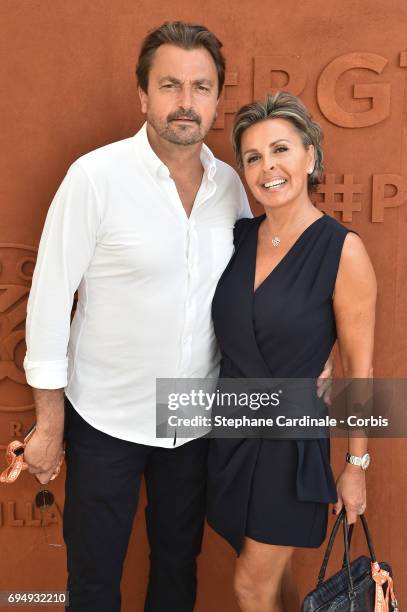 Henri Leconte and Maria Dowlatshahi attend the Men Final of the 2017 French Tennis Open - Day Fifteen at Roland Garros on June 11, 2017 in Paris,...