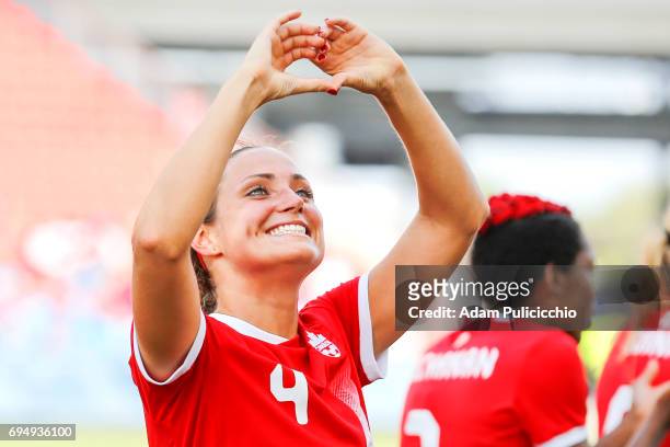 Defender Shelina Zadorsky of Team Canada makes a heart with her hands towards the crowd after defeating Team Costa Rica 6 - 0 in a exhibition match...