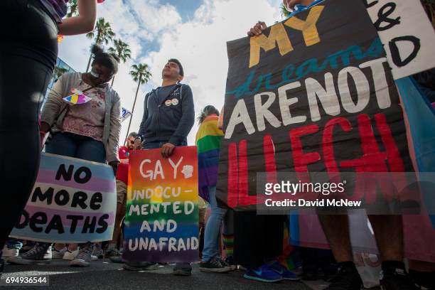 An undocumented gay immigrant participates in the #ResistMarch during the 47th annual LA Pride Festival on June 11 in the Hollywood section of Los...