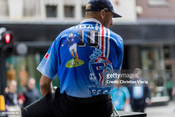 Guest wearing a France football team jersey of Zidane during the London Fashion Week Men's June 2017 collections on June 11, 2017 in London, England.