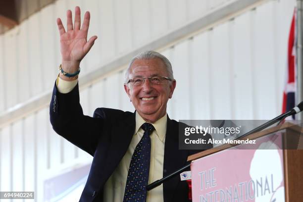 Announcer Barry Tompkins waves during the International Boxing Hall of Fame induction Weekend of Champions event on June 11, 2017 in Canastota, New...