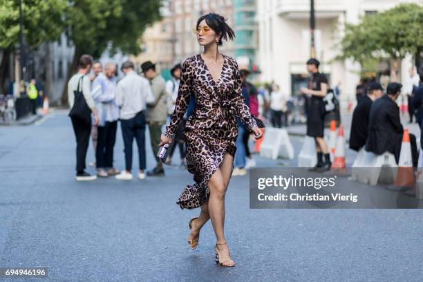 Betty Bachz wearing a dress with leopard print during the London Fashion Week Men's June 2017 collections on June 11, 2017 in London, England.