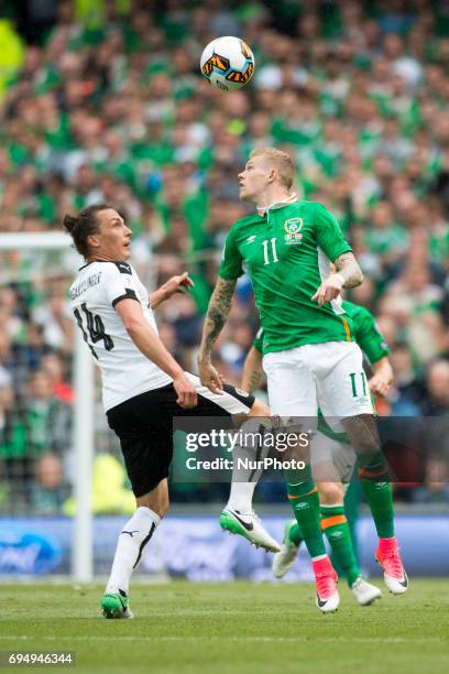 James McClean of Ireland duels with Julian Baumgartlinger of Austria during the FIFA World Cup 2018 Qualifying Round Group D match between Republic...