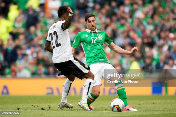 Stephen Ward of Ireland battle with Valentino Lazaro of Austria during the FIFA World Cup 2018 Qualifying Round Group D match between Republic of...