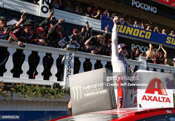 Ryan Blaney, driver of the Motorcraft/Quick Lane Tire & Auto Center Ford, celebrates in Victory Lane after winning the Monster Energy NASCAR Cup...