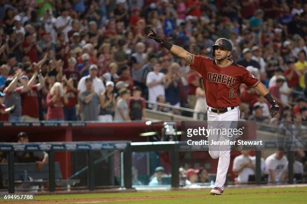 David Peralta of the Arizona Diamondbacks points to the stands after hitting a two run homer in the seventh inning against the Milwaukee Brewers at...