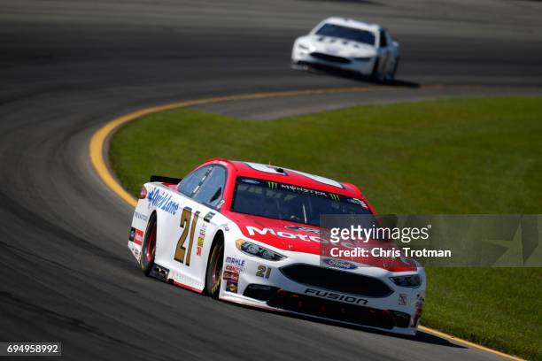 Ryan Blaney, driver of the Motorcraft/Quick Lane Tire & Auto Center Ford, leads Brad Keselowski, driver of the Miller Lite Ford, during the Monster...
