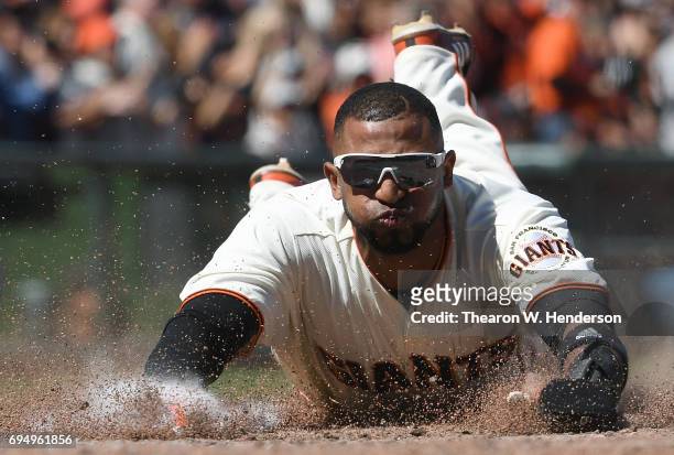 Eduardo Nunez of the San Francisco Giants scores against the Minnesota Twins in the bottom of the seventh inning at AT&T Park on June 11, 2017 in San...