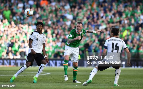 Glenn Whelan of Republic of Ireland and David Alaba of Austria during the FIFA 2018 World Cup Qualifier between Republic of Ireland and Austria at...