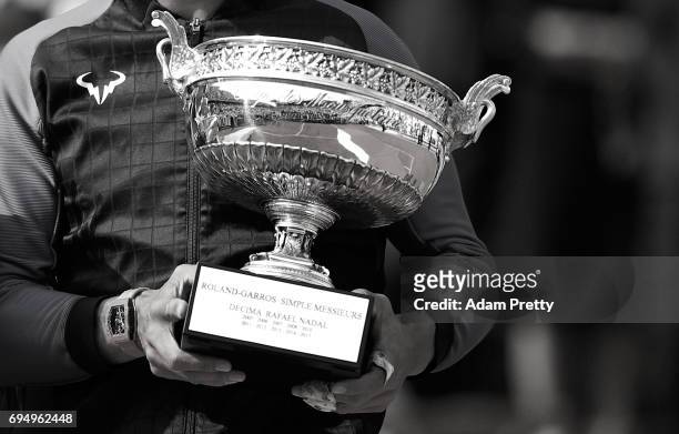 Detailed view as Rafael Nadal of Spain holds the Decima trophy following his victory in the mens singles final against Stan Wawrinks of Switzerland...