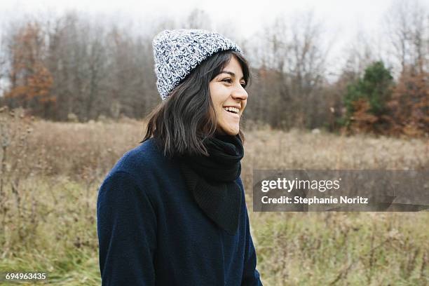 portrait of woman laughing in the park - amusement park ohio stock-fotos und bilder