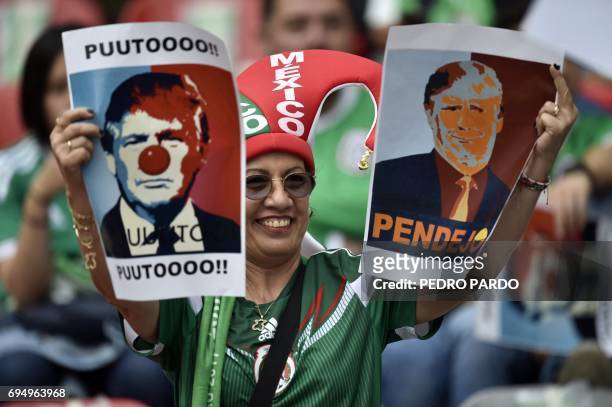 Supporter of Mexico mocks US President Donald Trump before the start of the 2018 World Cup Concacaf qualifier football match between Mexico and the...