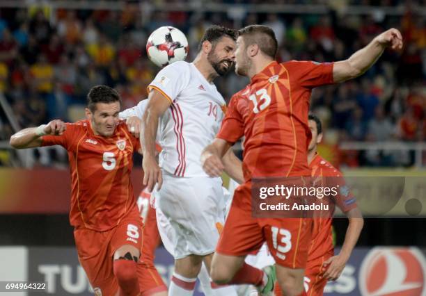 Diego Costa of Spain in action against Daniel Mojsov of Macedonia during the FIFA 2018 World Cup Qualifiers Group G match between Macedonia and Spain...