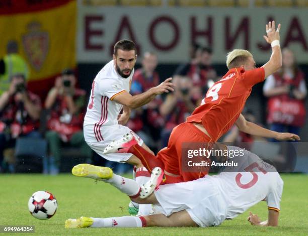 Dani Carvajal of Spain in action against Egzijan Aliovskiv of Macedonia during the FIFA 2018 World Cup Qualifiers Group G match between Macedonia and...