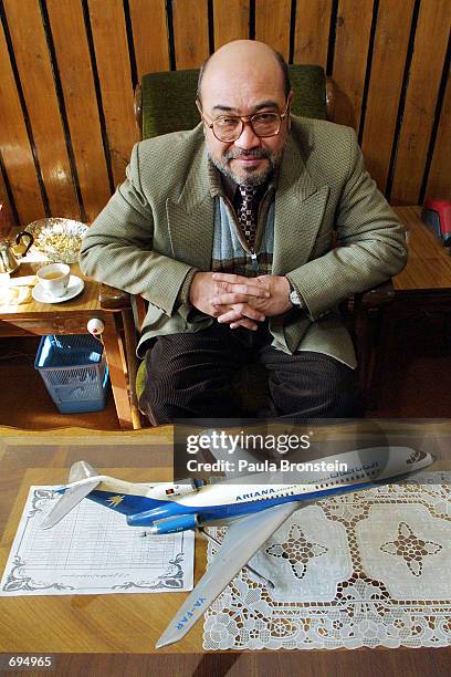 Abdul Rahman, interim Afghan Minister of Civil Aviation and Tourism, sits in his office January 22, 2002 in Kabul. Al-Jazeera television reported...