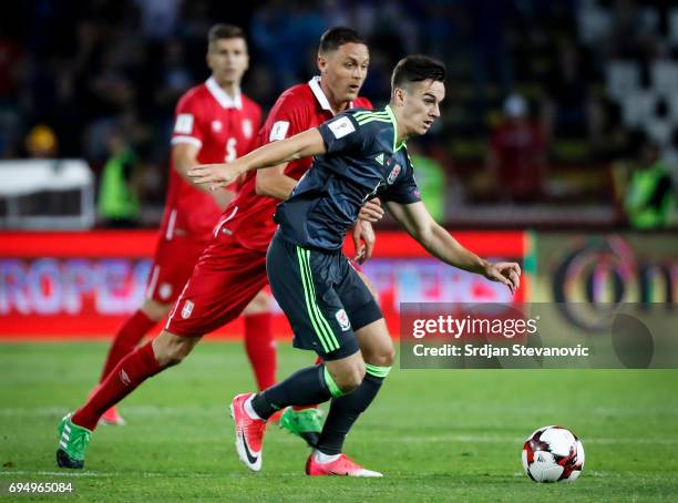 Tom Lawrence of Wales in action against Nemanja Matic of Serbia during the FIFA 2018 World Cup Qualifier between Serbia and Wales at stadium Rajko...