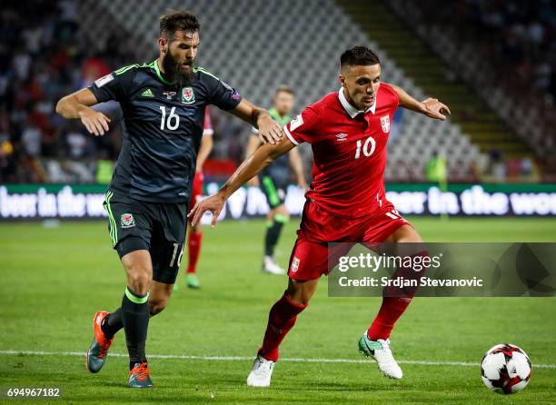 Dusan Tadic of Serbia in action against Joe Ladley of Wales during the FIFA 2018 World Cup Qualifier between Serbia and Wales at stadium Rajko Mitic...