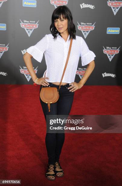 Actress Catherine Bell arrives at the premiere of Disney And Pixar's "Cars 3" at Anaheim Convention Center on June 10, 2017 in Anaheim, California.