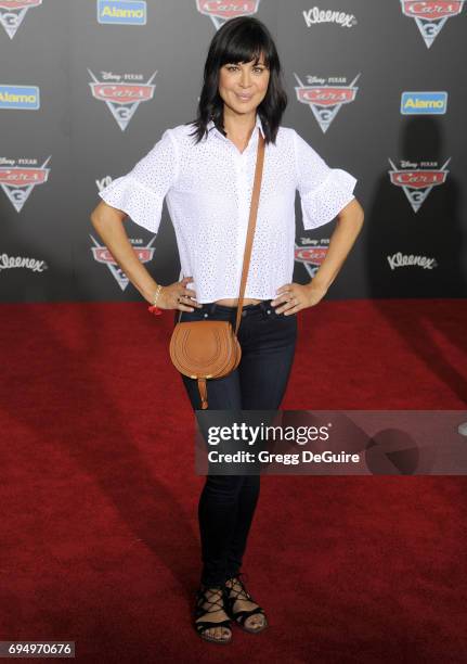 Actress Catherine Bell arrives at the premiere of Disney And Pixar's "Cars 3" at Anaheim Convention Center on June 10, 2017 in Anaheim, California.