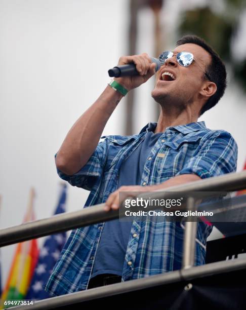 Actor/singer Cheyenne Jackson performs the national anthem at the LA Pride ResistMarch on June 11, 2017 in West Hollywood, California.