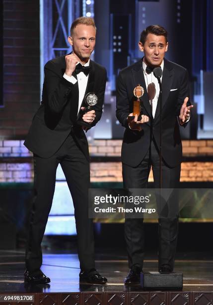 Benj Pasek and Justin Paul accept the award for Best Original Score Written for the Theatre for Dear Evan Hansen onstage during the 2017 Tony...