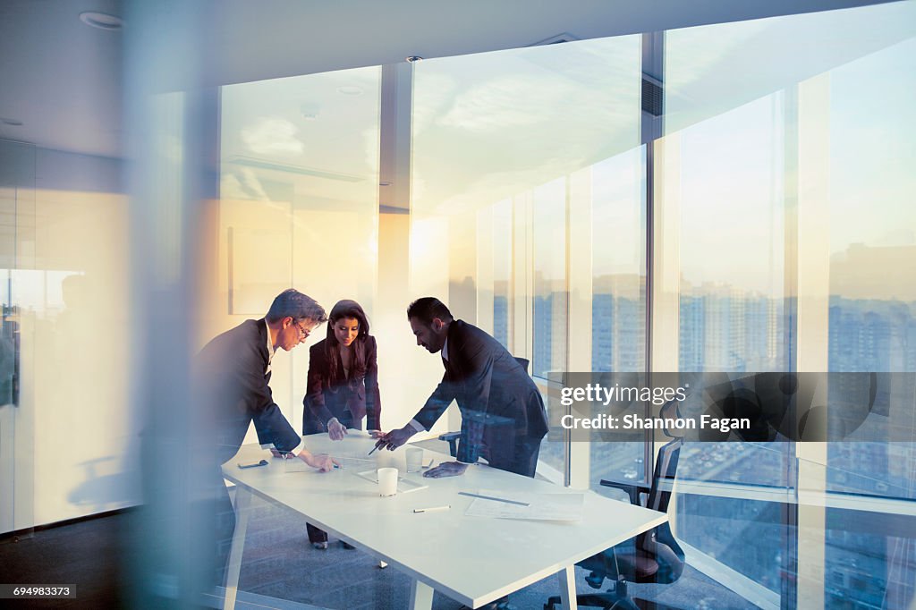 Business colleagues planning together in meeting