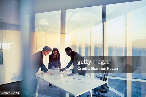 Business colleagues planning together in meeting Business colleagues planning together in meeting