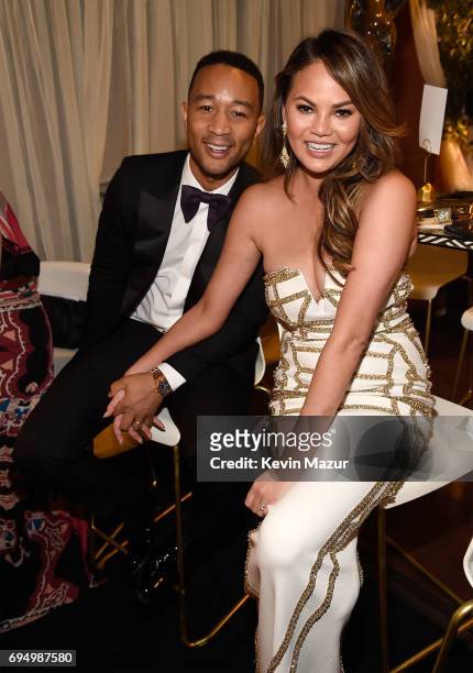 John Legend and Chrissy Teigen attend the 2017 Tony Awards at Radio City Music Hall on June 11, 2017 in New York City.