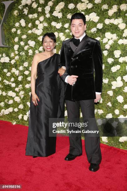 Actress Baayork Lee and designer Malan Breton attend the 71st Annual Tony Awards at Radio City Music Hall on June 11, 2017 in New York City.
