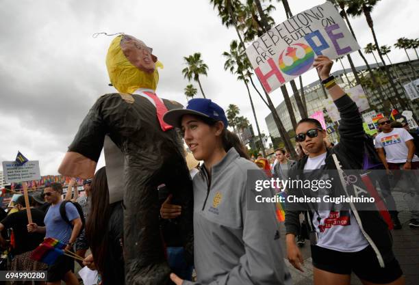 Participants march during the LA Pride ResistMarch on June 11, 2017 in West Hollywood, California.