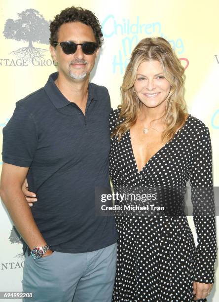 Grant Heslov and Lysa Hayland Heslov attend the Children Mending Hearts 9th Annual Empathy Rocks Fundraiser held at Private Residence on June 11,...