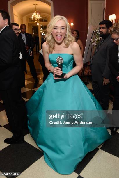Rachel Bay Jones, winner of the award for Best Performance by an Actress in Featured Role a Musical for Dear Evan Hansen, poses in the press room...