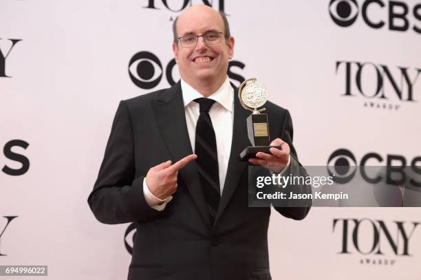 Christopher Ashley, winner of the award for Best Direction of a Musical for Come From Away, poses in the press room during the 2017 Tony Awards at...