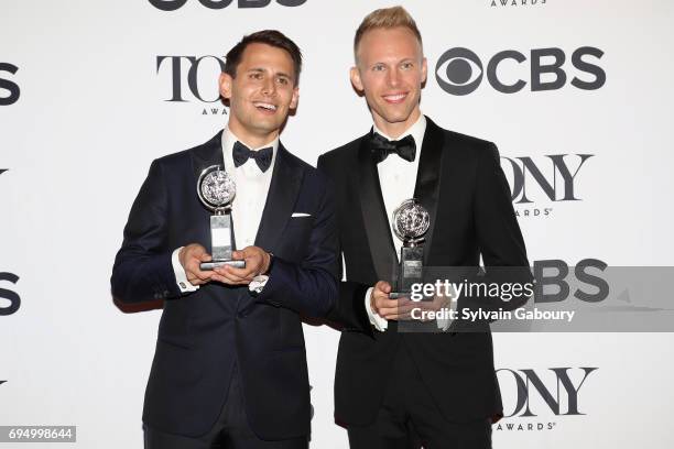 Benj Pasek and Justin Paul, winners of the award for Best Score for Dear Evan Hansen, pose in the press room during the 2017 Tony Awards at 3 West...