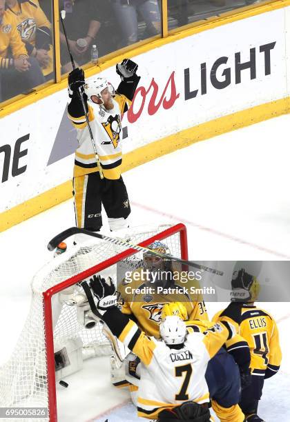 Patric Hornqvist of the Pittsburgh Penguins celebrates after scoring a goal against Pekka Rinne of the Nashville Predators during the third period in...