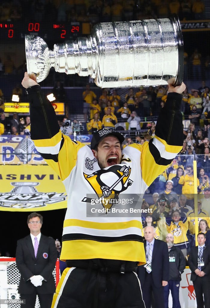 Sidney Crosby Of The Pittsburgh Penguins Celebrates With The Stanley sidney-crosby-of-the-pittsburgh-penguins-celebrates-with-the-stanley