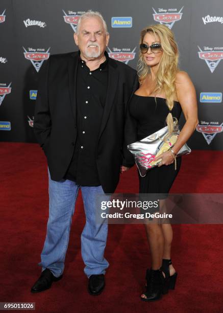 John Ratzenberger and wife Julie Blichfeldt arrive at the premiere of Disney And Pixar's "Cars 3" at Anaheim Convention Center on June 10, 2017 in...