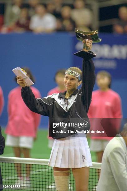 Iva Majoli of Croatia celebrates with the trophy after winning the singles final against Arantxa Sanchez Vicario of Spain during day six of the Toray...
