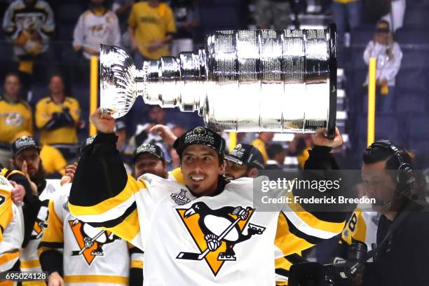 Marc-Andre Fleury of the Pittsburgh Penguins celebrates with the Stanley Cup Trophy after defeating the Nashville Predators 2-0 in Game Six of the...