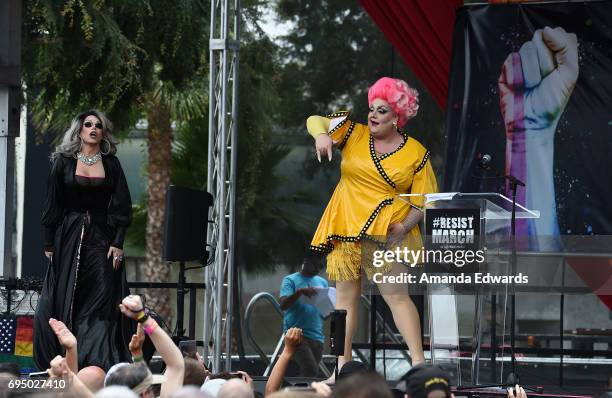 Drag queens Eureka! and Morgan McMichaels attend the LA Pride ResistMarch on June 11, 2017 in West Hollywood, California.