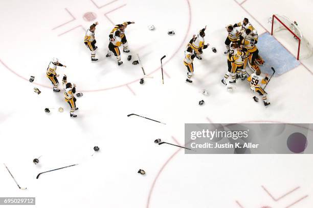 Matt Murray of the Pittsburgh Penguins celebrates with teammates after they defeated the Nashville Predators 2-0 to win the 2017 NHL Stanley Cup...