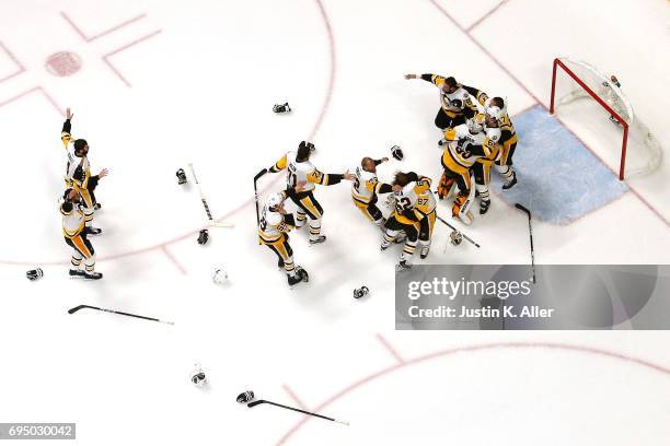 Matt Murray of the Pittsburgh Penguins celebrates with teammates after they defeated the Nashville Predators 2-0 to win the 2017 NHL Stanley Cup...